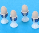 Tc1328 - Egg cups with eggs
