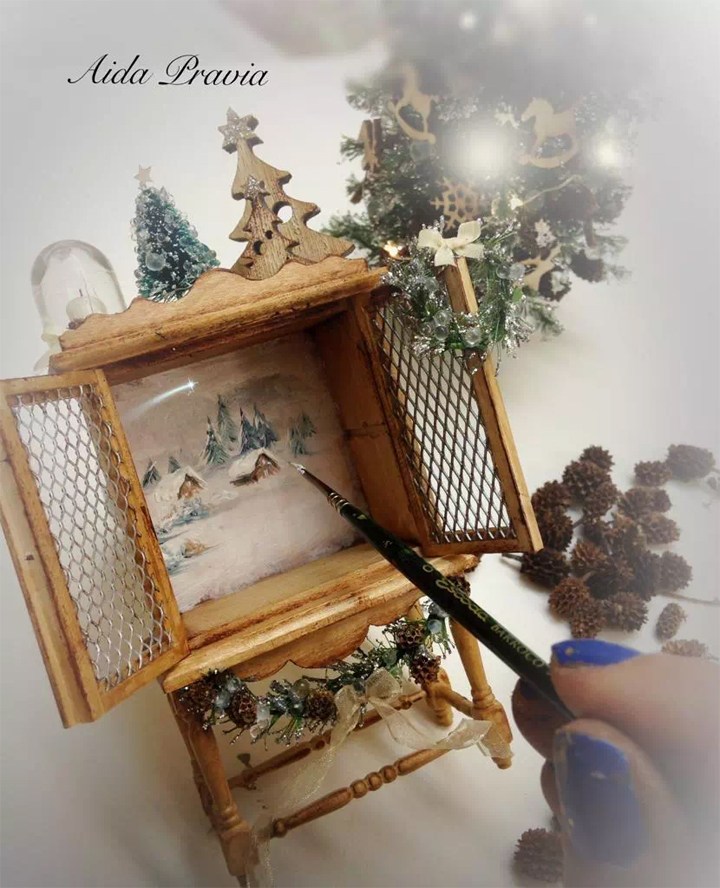 Pintando paisaje navideño en miniatura